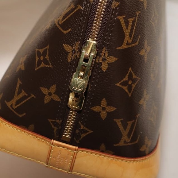 Authentic Monogram Alma - Picture 2 of 9